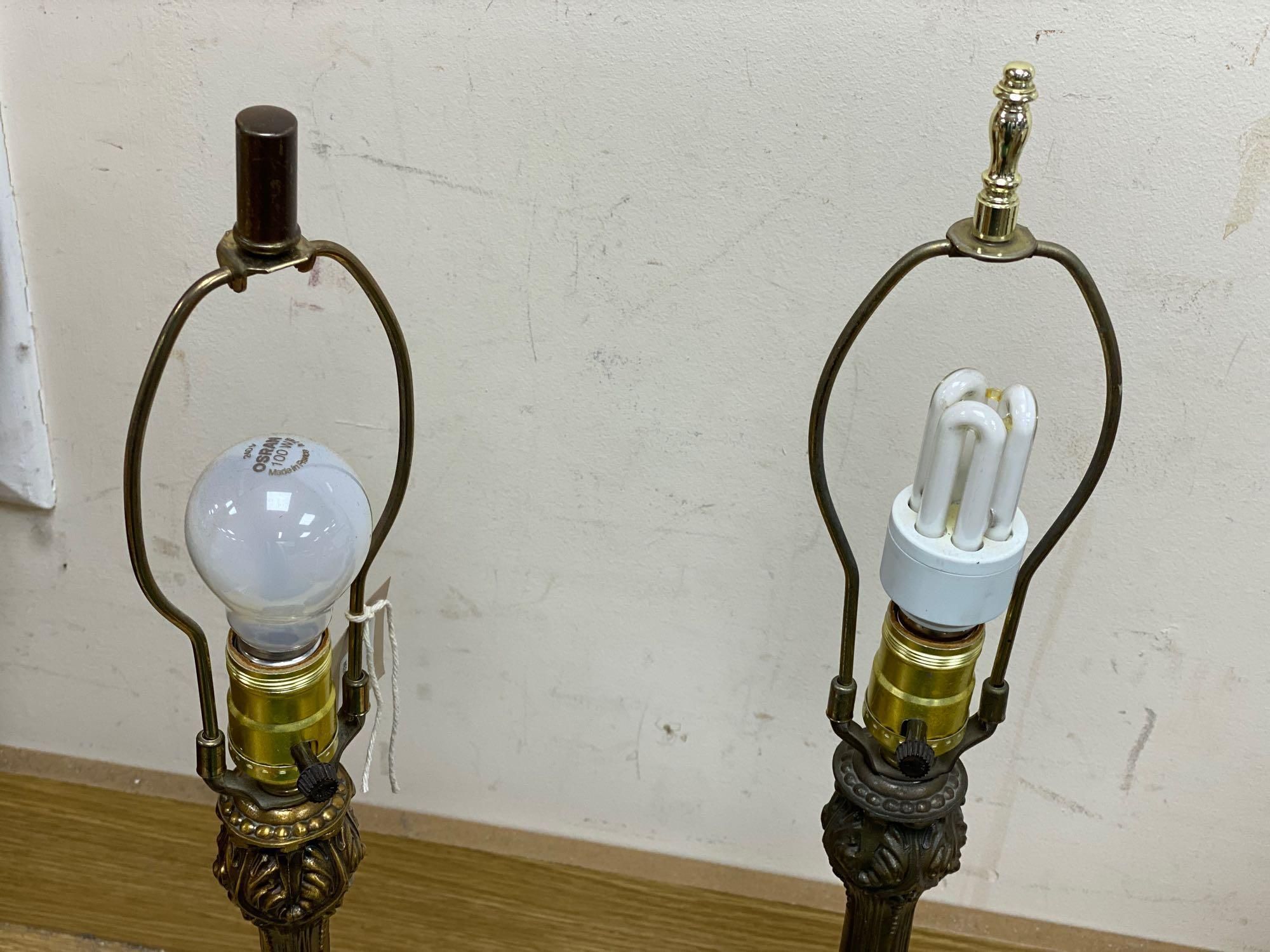 A pair of brass Art Nouveau style lamps